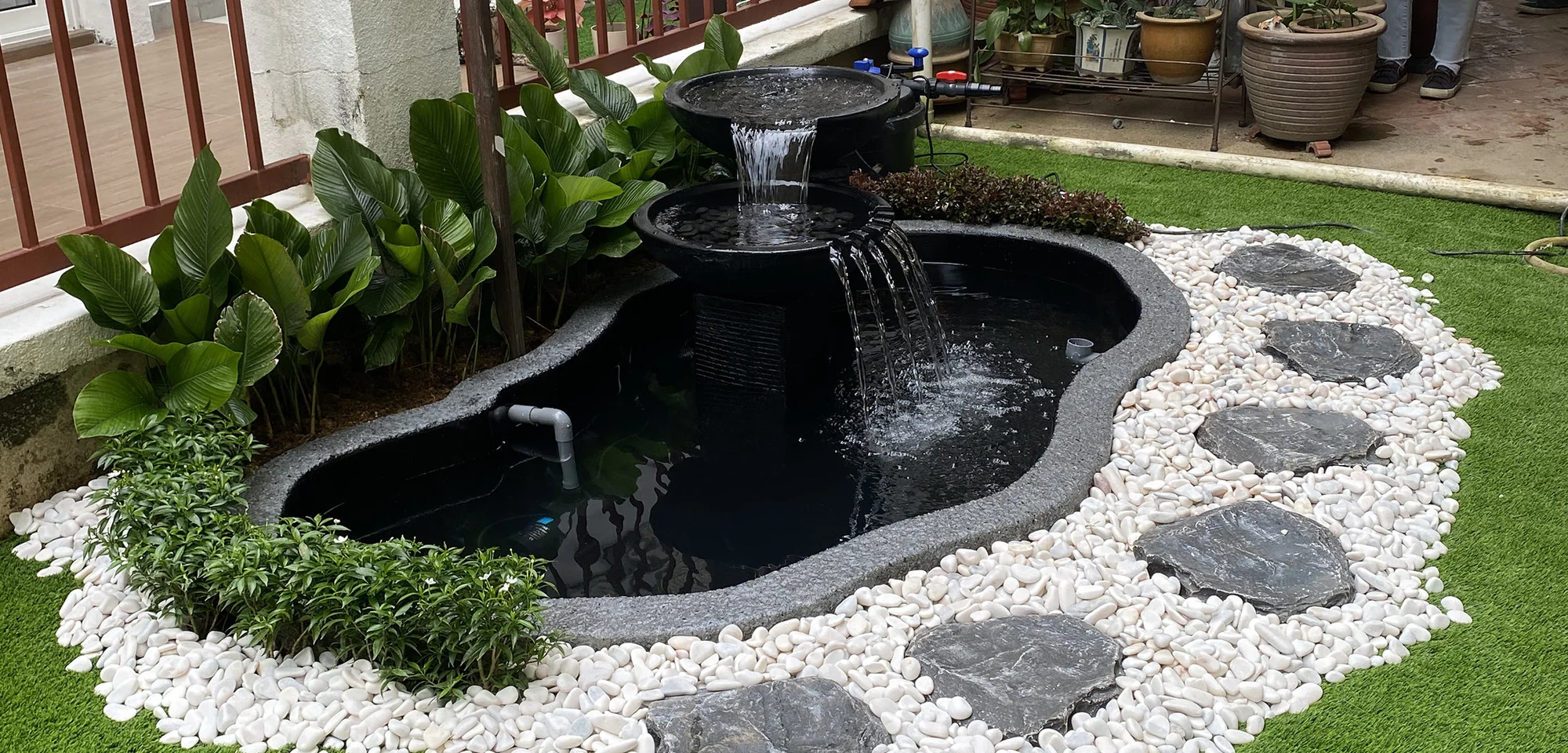 Desain kolam ikan dengan konsep Zen mini ala Jepang Desain kolam ikan dengan konsep Zen mini ala Jepang